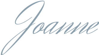 A cursive form of the name Joanne.